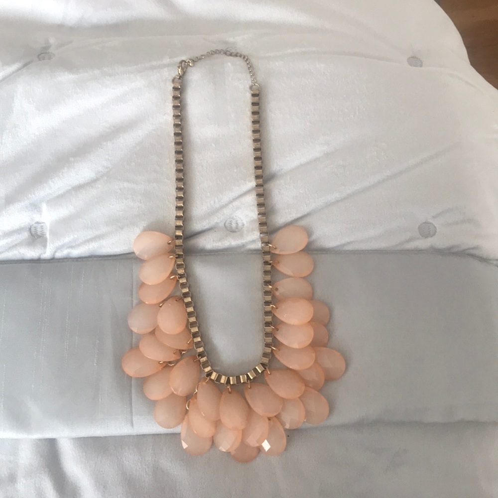 Goldtone peach faceted dangle necklace